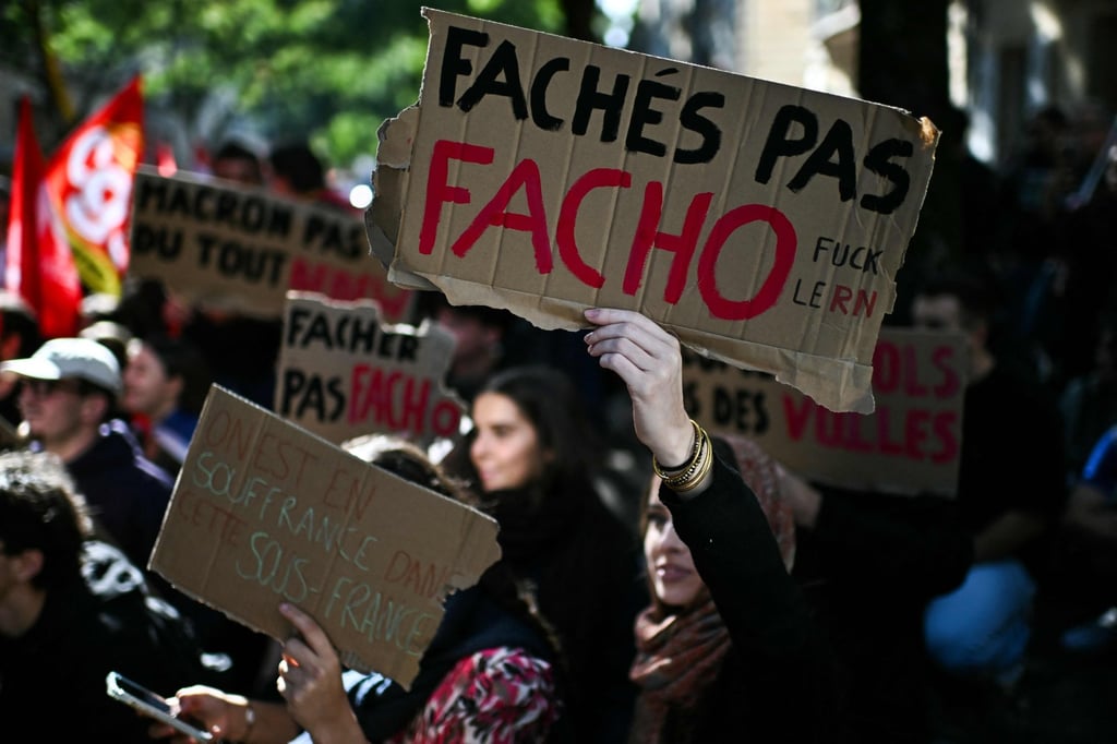 A protester holds a placard reading “Angry not fascist” during a demonstration of high school students in Bordeaux, France, on Thursday. Photo: AFP A protester holds a placard reading “Angry not fascist” during a demonstration of high school students in Bordeaux, France, on Thursday. Photo: AFP