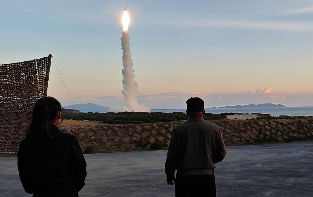 North Korean leader Kim Jong-un is seen alongside his daughter (left) observing a ballistic missile launch in the country’s eastern region on October 3. Photo: KCNA/KNS/dpa North Korean leader Kim Jong-un is seen alongside his daughter (left) observing a ballistic missile launch in the country’s eastern region on October 3. Photo: KCNA/KNS/dpa