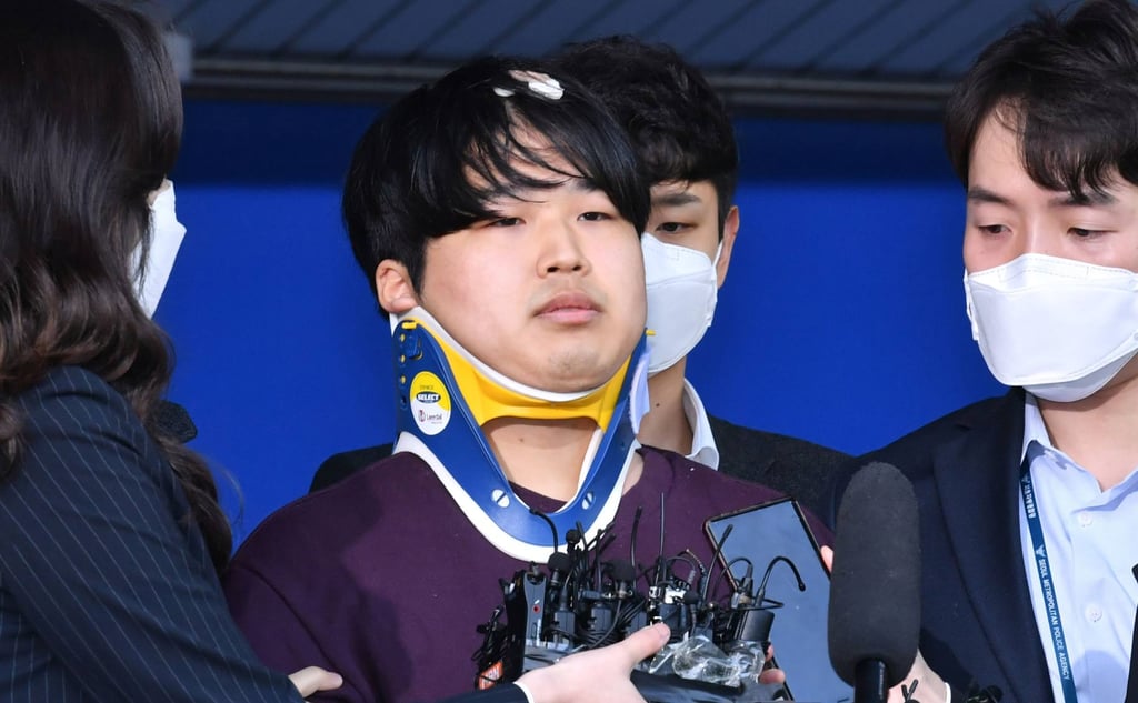 South Korean suspect Cho Ju-bin at a police station in Seoul in 2020. He was suspected of blackmailing dozens of victims, including minors, into performing sex acts and selling the videos in chat rooms. Photo: AFP South Korean suspect Cho Ju-bin at a police station in Seoul in 2020. He was suspected of blackmailing dozens of victims, including minors, into performing sex acts and selling the videos in chat rooms. Photo: AFP