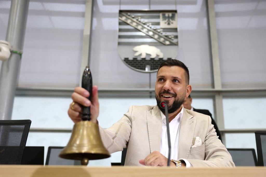 Saxony-Anhalt’s newly elected regional parliament president Tobias Rausch of the far-right Alternative for Germany rings the bell during the constitutional session of the parliament in Magdeburg, Germany, on October 6. Photo: Reuters
