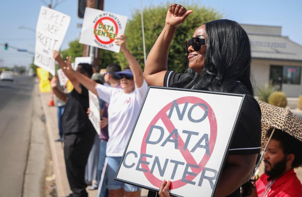 Demonstrators wave signs during a protest against AI data centre expansion in Imperial, California, on July 18. Photo: AFP Demonstrators wave signs during a protest against AI data centre expansion in Imperial, California, on July 18. Photo: AFP