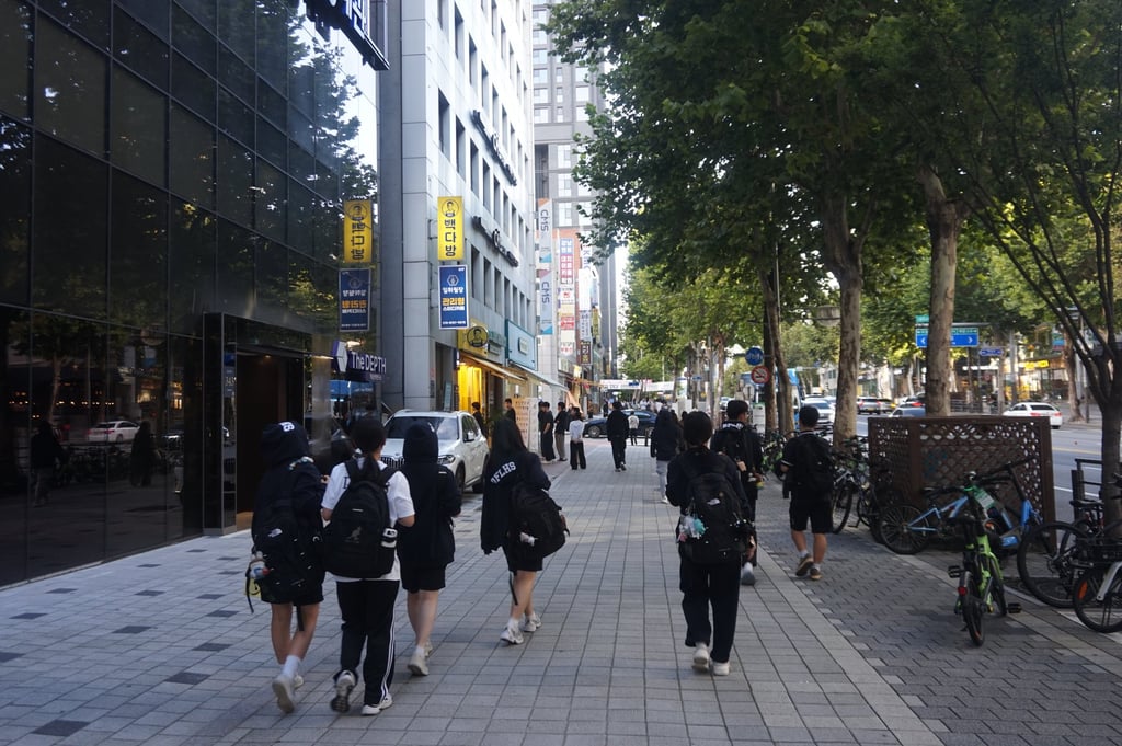 Students walk to an after-school cram school, or hagwon, in Daechi-dong, Seoul, South Korea. Photo: SCMP Students walk to an after-school cram school, or hagwon, in Daechi-dong, Seoul, South Korea. Photo: SCMP