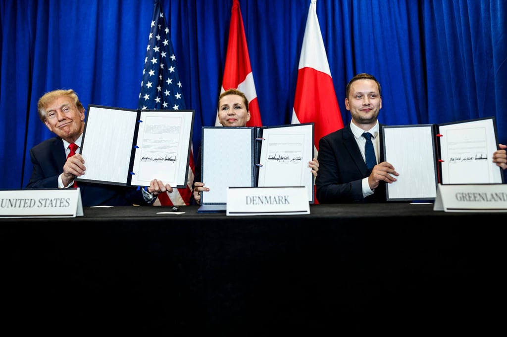 (From left) US President Donald Trump, Danish Prime Minister Mette Frederiksen and Greenland’s Prime Minister Jens-Frederik Nielsen hold up the signed security pact at the UN headquarters in New York on September 22. Photo: Daniel Torok/Planet Pix via ZUMA (From left) US President Donald Trump, Danish Prime Minister Mette Frederiksen and Greenland’s Prime Minister Jens-Frederik Nielsen hold up the signed security pact at the UN headquarters in New York on September 22. Photo: Daniel Torok/Planet Pix via ZUMA