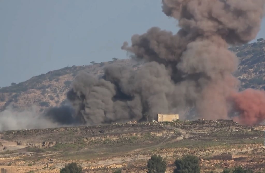 Dust rises following a Saudi air strike on a Houthi position in Taiz province, Yemen. Photo: EPA