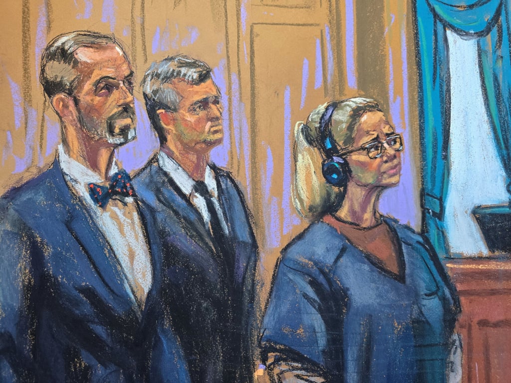 Flores stands beside lawyers Mark Donnelly and Andres Sanchez during an appearance in Manhattan federal court in New York on Thursday. Photo: Reuters Flores stands beside lawyers Mark Donnelly and Andres Sanchez during an appearance in Manhattan federal court in New York on Thursday. Photo: Reuters
