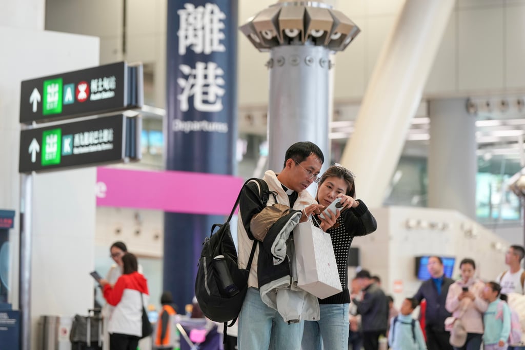 Travellers at Hong Kong’s West Kowloon Station on January 11. The Guangzhou-Shenzhen-Hong Kong Express Rail Link connects Hong Kong with the mainland’s high-speed railway network. Photo: Sam Tsang