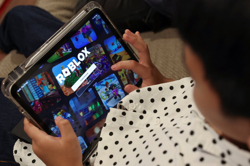 A 10-year-old Indonesian boy logs on to the popular video game platform Roblox using an iPad in March. Photo: Reuters A 10-year-old Indonesian boy logs on to the popular video game platform Roblox using an iPad in March. Photo: Reuters