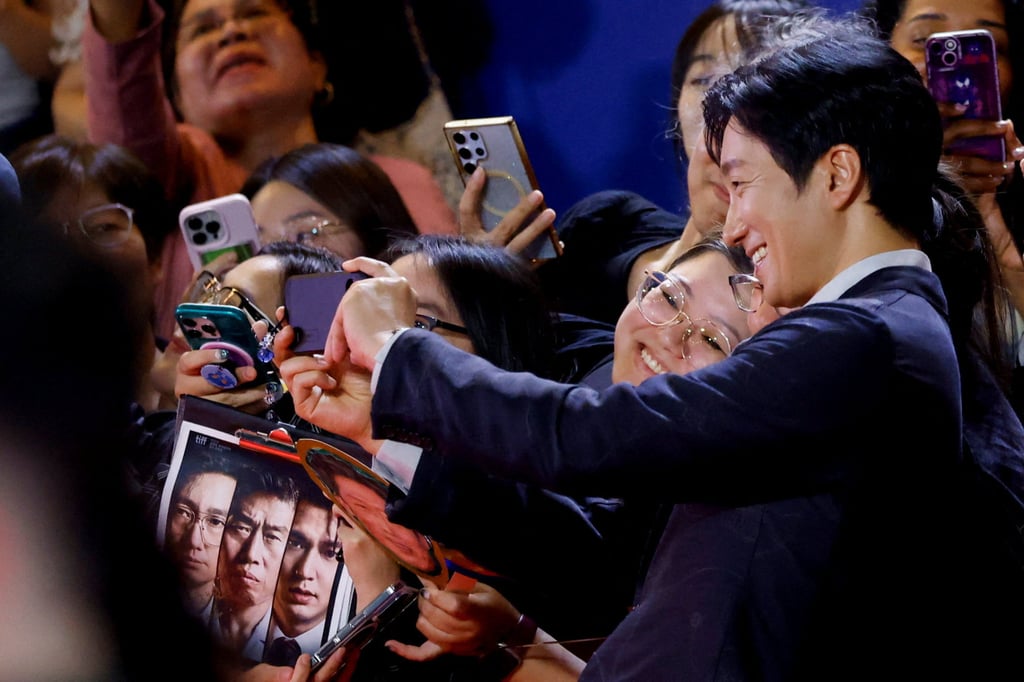Actor Park Hae-il takes a selfie as he attends the red carpet for “The Assassin(s)“ at the Toronto International Film Festival in Canada last month. Photo: Reuters