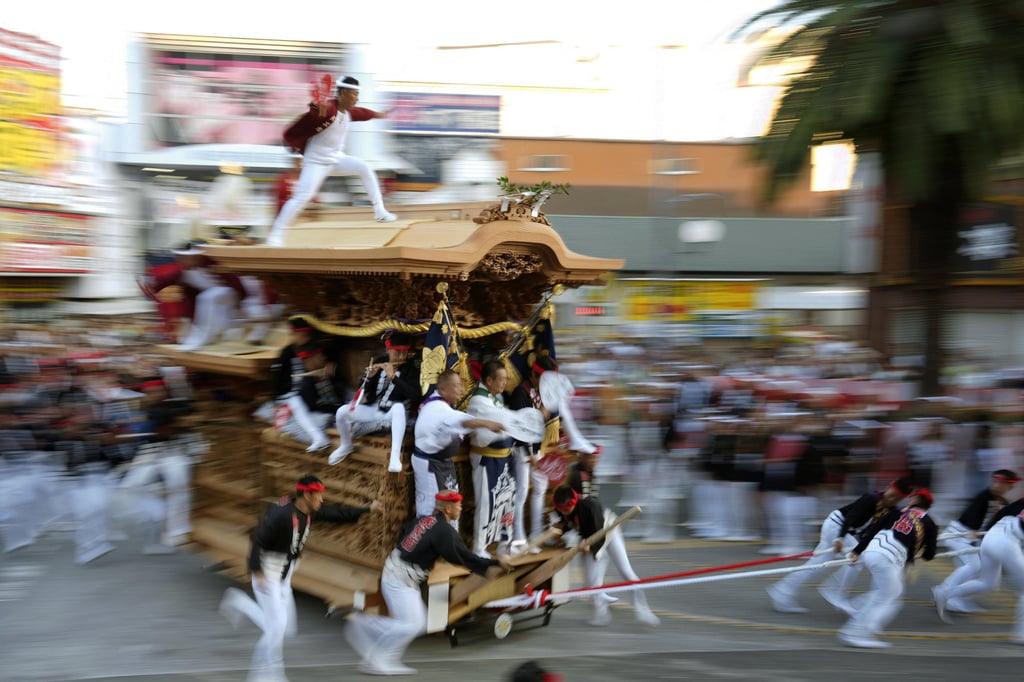 People pull a “danjiri” float in Kishiwada in Osaka in 2024. Photo: Kyodo