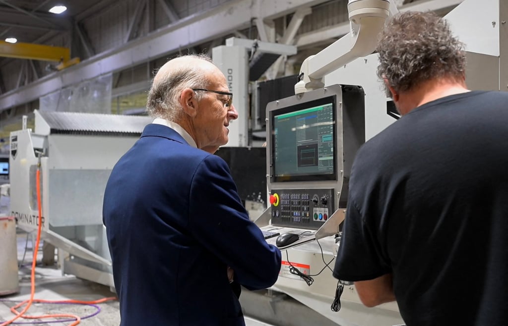 US manufacturer Sam Miller (left) speaks with a worker at his factory in Warren, Ohio, on September 30. Photo: AFP US manufacturer Sam Miller (left) speaks with a worker at his factory in Warren, Ohio, on September 30. Photo: AFP