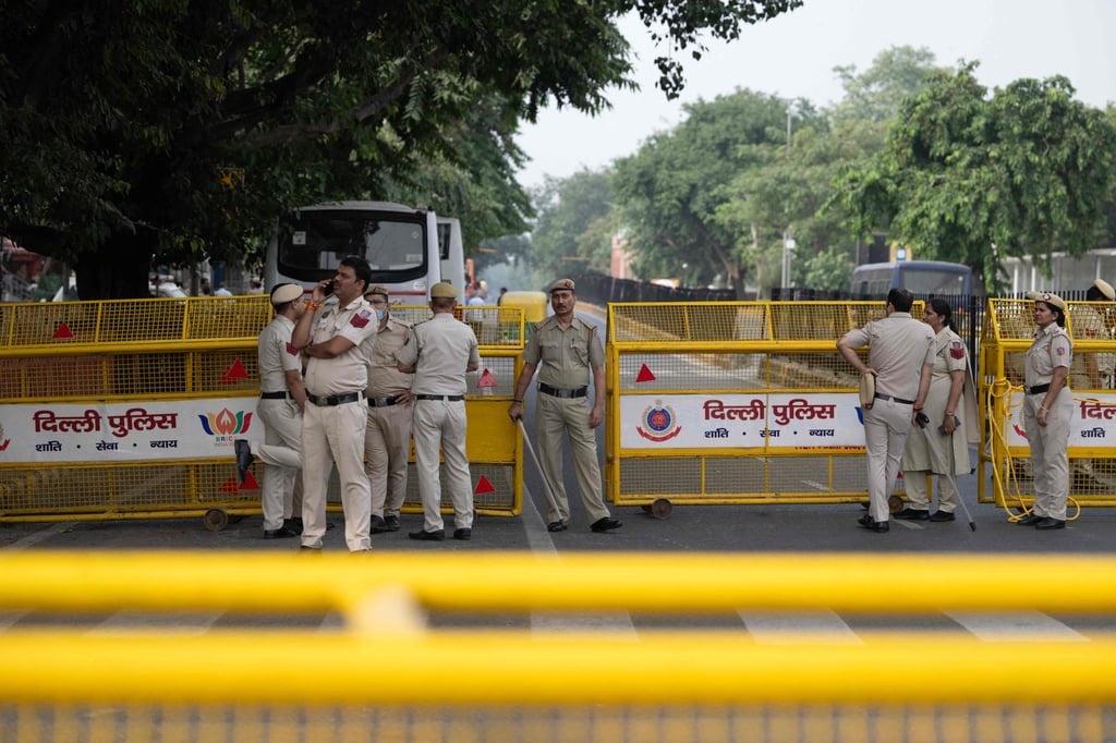 Police officers stand guard at a security checkpoint near Jantar Mantar in New Delhi, India, on Sunday. Photo: AFP Police officers stand guard at a security checkpoint near Jantar Mantar in New Delhi, India, on Sunday. Photo: AFP