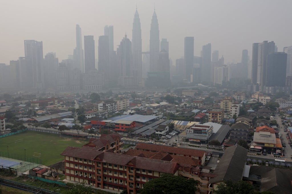 The skyline of Malaysia’s capital Kuala Lumpur is shrouded in haze from regional wildfires on Friday. Photo: Reuters