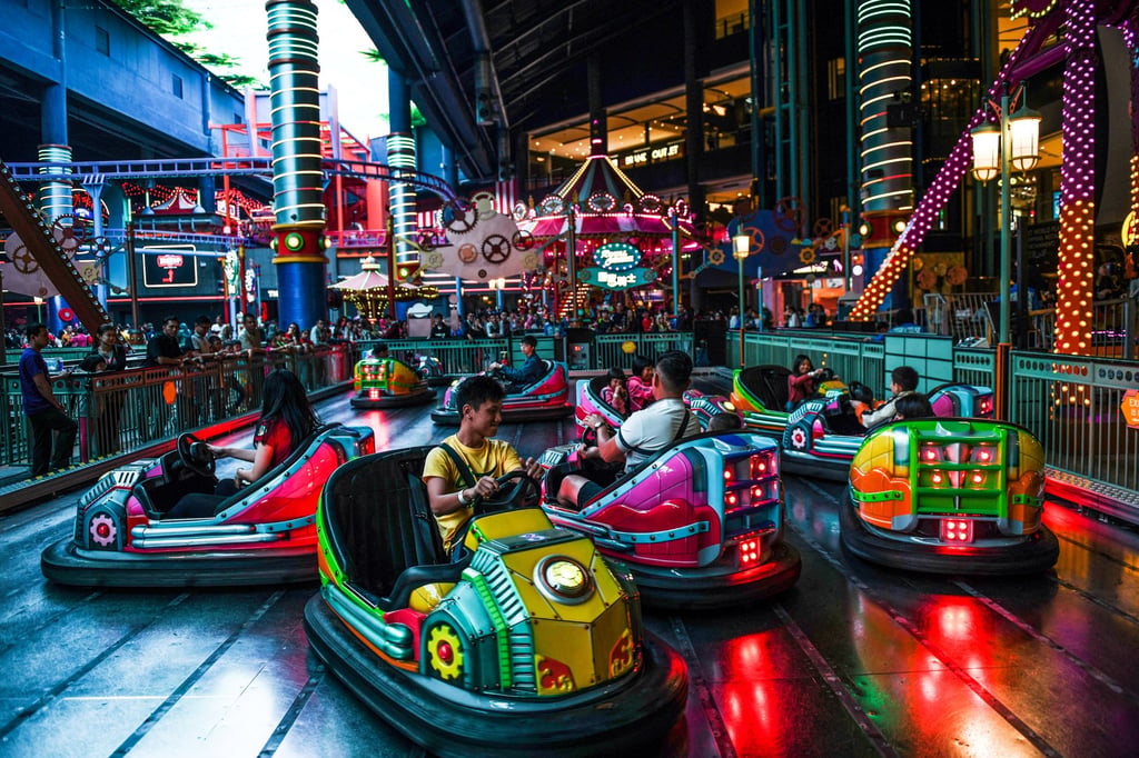 People ride dodgems at an indoor amusement park in Genting Highlands resort, Malaysia, in 2019. Photo: AFP