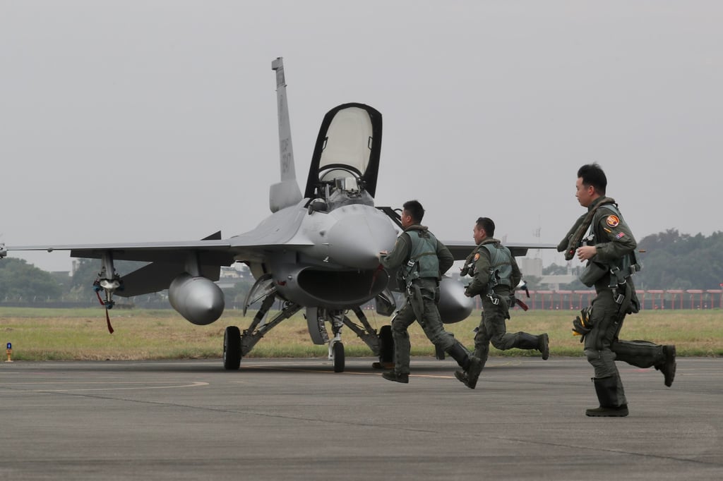 Taiwan Air Force pilots run towards F-16V fighter jets during a military drill in Chiayi, Taiwan, in 2022. Photo: EPA-EFE Taiwan Air Force pilots run towards F-16V fighter jets during a military drill in Chiayi, Taiwan, in 2022. Photo: EPA-EFE