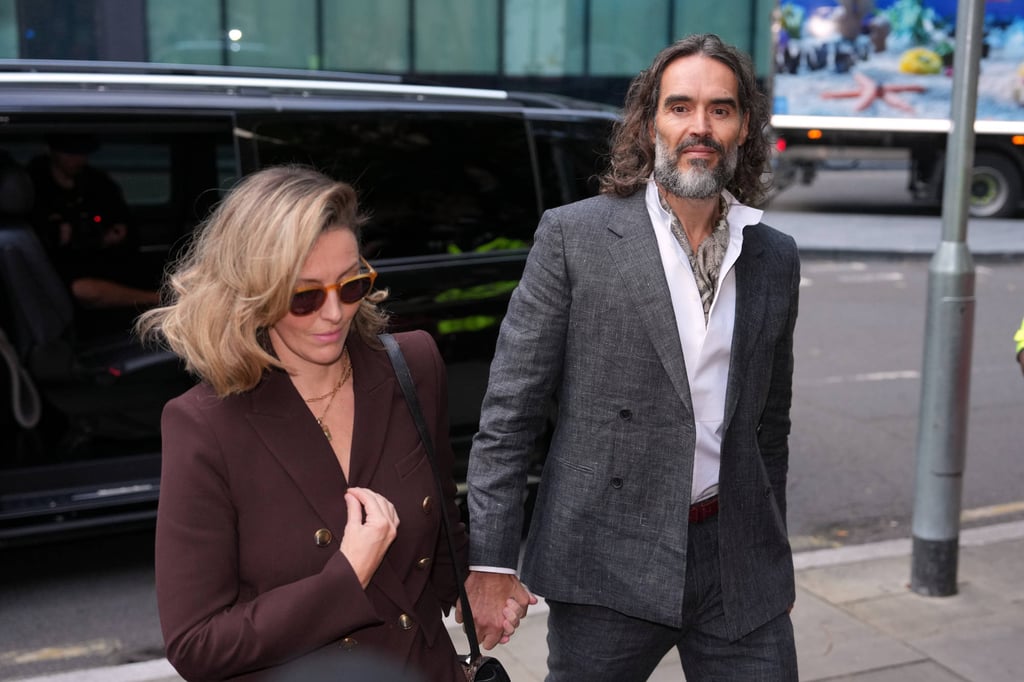 Russell Brand, accompanied by his wife Laura, has denied the charges against him. Photo: AP Russell Brand, accompanied by his wife Laura, has denied the charges against him. Photo: AP