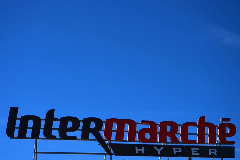The logo of French supermarket Intermarche on the facade of a store. Several supermarkets in France have been hit by a cyberattack targeting refrigeration facilities. Photo: AFP