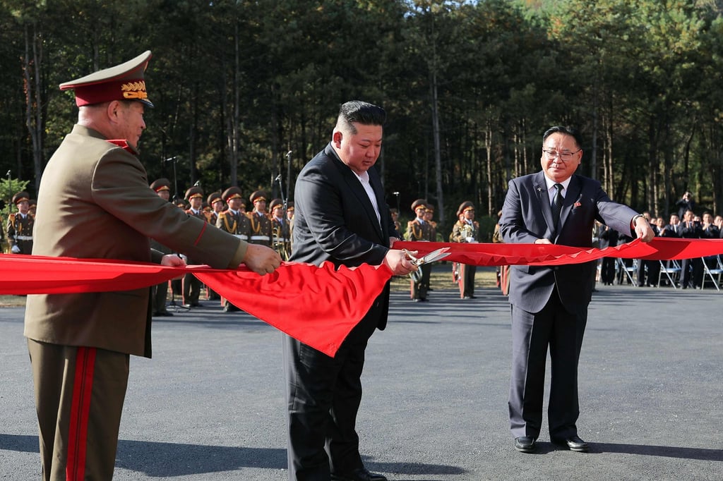 Kim Jong-un cuts a red ribbon during the opening ceremony of the National Defence Revolution Museum on Sunday. Photo: KCNA/AFP Kim Jong-un cuts a red ribbon during the opening ceremony of the National Defence Revolution Museum on Sunday. Photo: KCNA/AFP