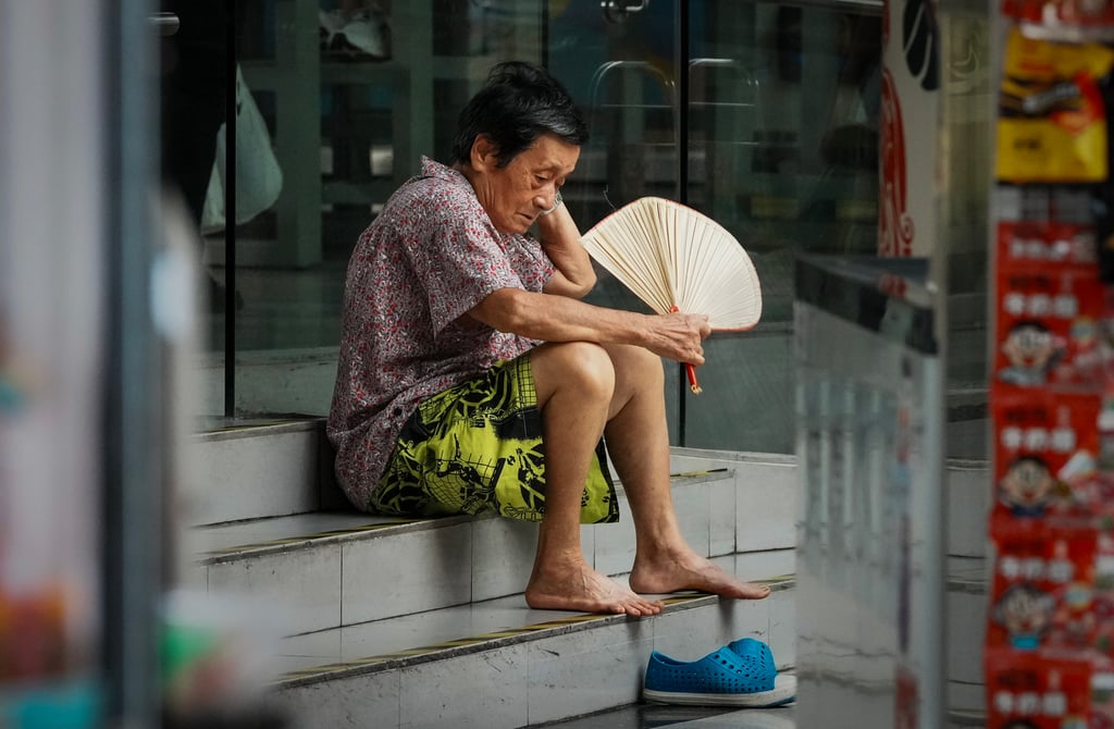 An elderly woman leaves her sweltering home to rest in a nearby air-conditioned shopping mall in Sham Shui Po on August 24. Elderly residents are increasingly vulnerable to Hong Kong’s extreme temperatures. Photo: Dickson Lee An elderly woman leaves her sweltering home to rest in a nearby air-conditioned shopping mall in Sham Shui Po on August 24. Elderly residents are increasingly vulnerable to Hong Kong’s extreme temperatures. Photo: Dickson Lee