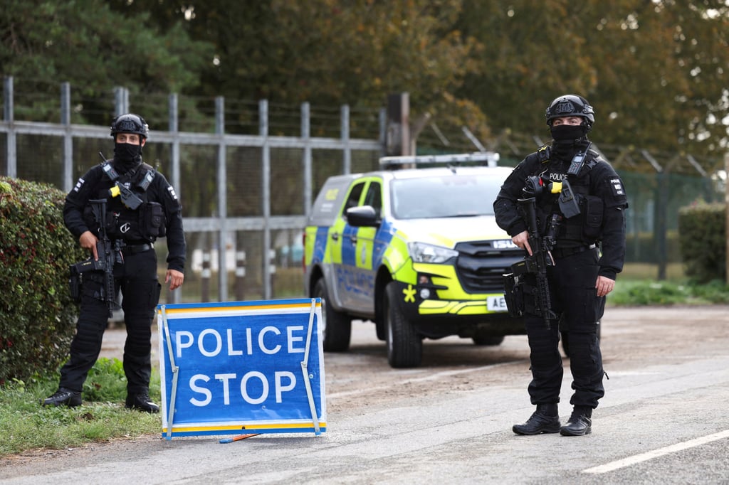 Armed police officers stand guard on a road outside the perimeter of the RAF Fairford airbase, after police declared a major incident at the base in Fairford, Gloucestershire, Britain on September 28. Photo: Reuters Armed police officers stand guard on a road outside the perimeter of the RAF Fairford airbase, after police declared a major incident at the base in Fairford, Gloucestershire, Britain on September 28. Photo: Reuters