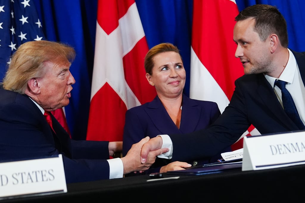 President Donald Trump (left) shakes hands with Greenland’s Prime Minister Jens-Frederik Nielsen (right) as Denmark’s Prime Minister Mette Frederiksen looks on in New York in September. Photo: AP President Donald Trump (left) shakes hands with Greenland’s Prime Minister Jens-Frederik Nielsen (right) as Denmark’s Prime Minister Mette Frederiksen looks on in New York in September. Photo: AP