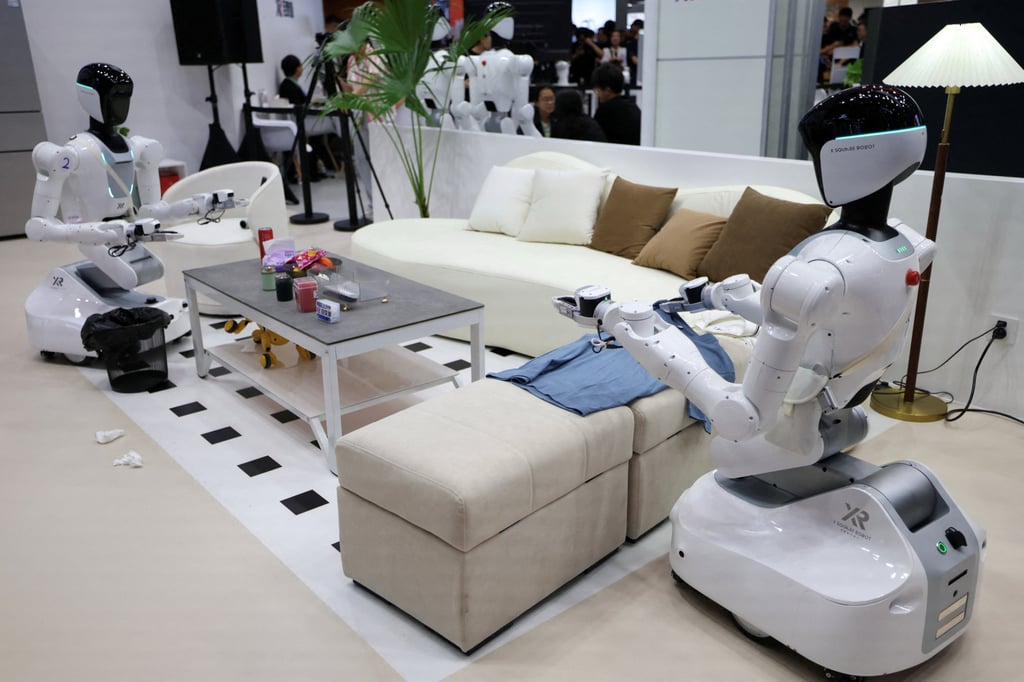 The photo above shows X Square humanoid robots demonstrating housework at a booth during the 2026 World Robot Conference in Beijing, China, on August 19, 2026. Photo: Reuters/Tingshu Wang