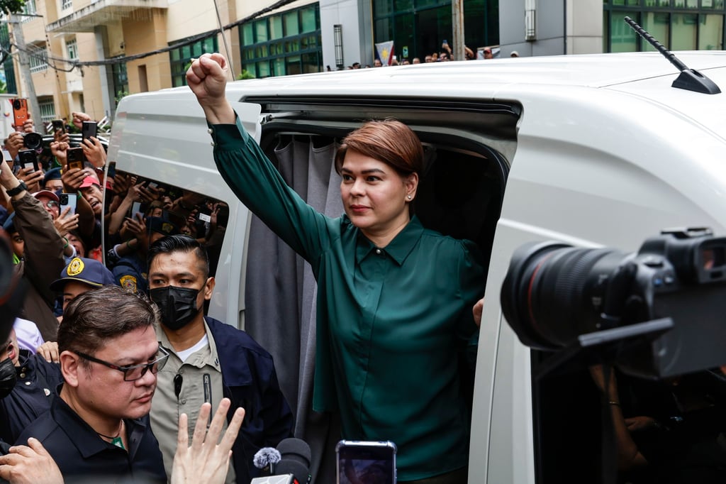 Philippine Vice-President Sara Duterte gestures after appearing before a trial court for a scheduled arraignment in Quezon City last month. Photo: EPA