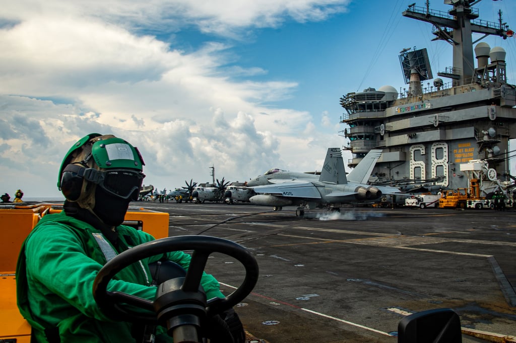 An F/A-18E Super Hornet lands on the flight deck of the aircraft carrier USS Nimitz in the South China Sea last year. Photo: handout