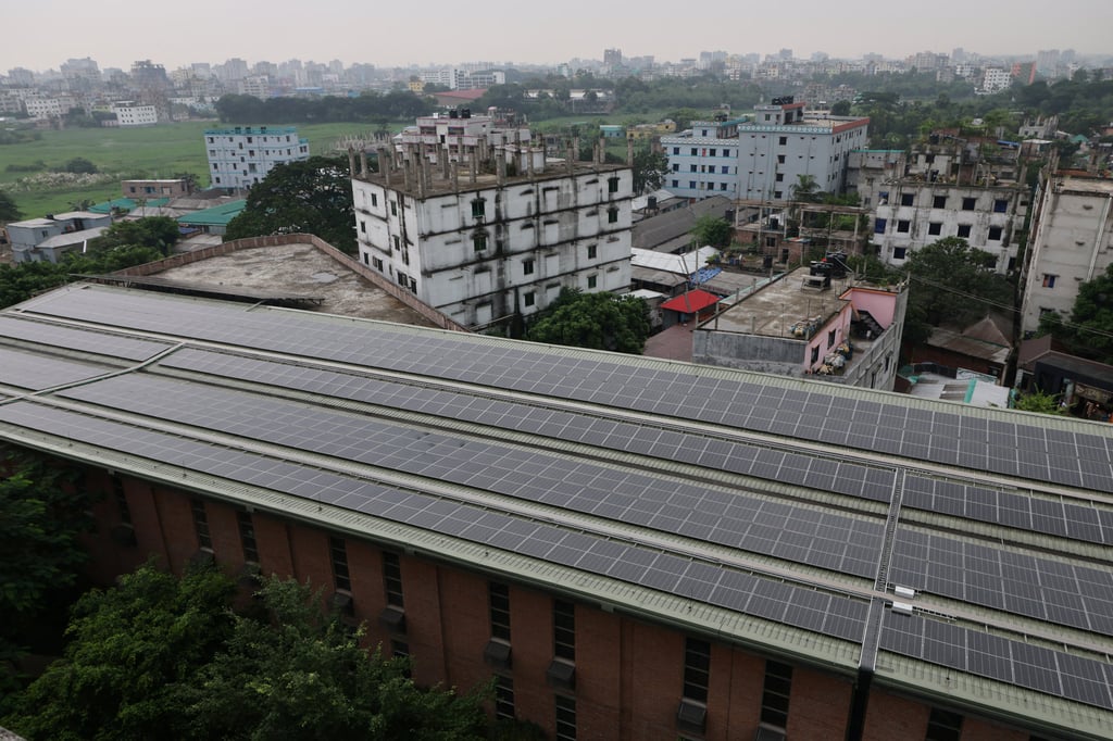 Solar panels on the rooftop of a factory amid efforts to tackle the energy crisis in Savar, on the outskirts of Dhaka, Bangladesh, on September 17. Photo: Reuters Solar panels on the rooftop of a factory amid efforts to tackle the energy crisis in Savar, on the outskirts of Dhaka, Bangladesh, on September 17. Photo: Reuters