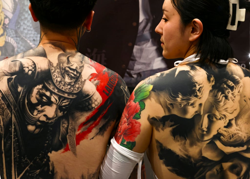 Visitors display their tattoos at the 7th Hong Kong China International Tattoo Exhibition at the Hong Kong Convention and Exhibition Centre, in Wan Chai, in 2023. Photo: Dickson Lee Visitors display their tattoos at the 7th Hong Kong China International Tattoo Exhibition at the Hong Kong Convention and Exhibition Centre, in Wan Chai, in 2023. Photo: Dickson Lee
