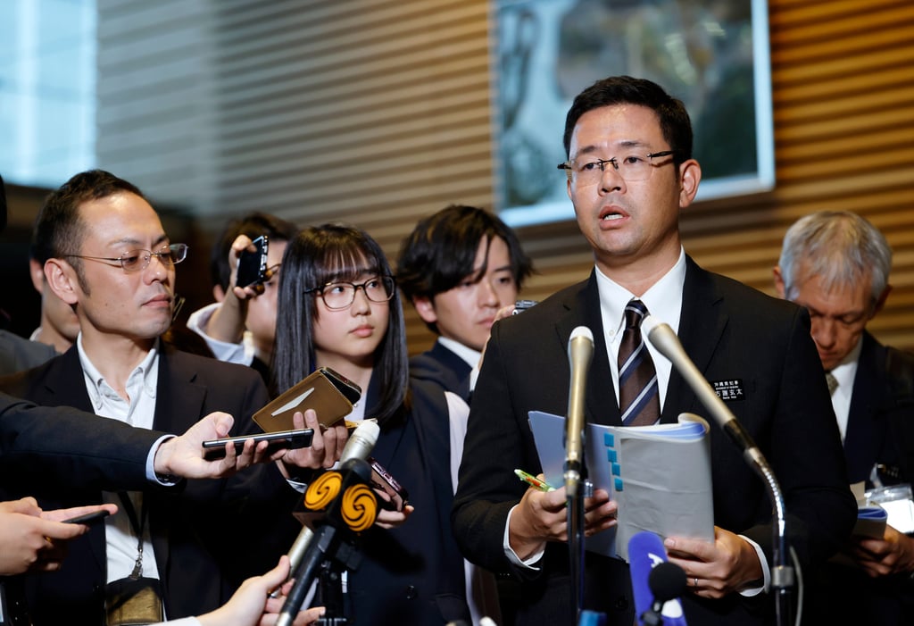 Okinawa Governor Genta Koja speaks to the media in Tokyo, Japan, on October 7. Photo: AP