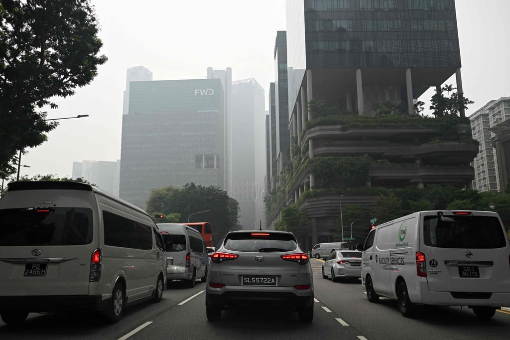 Buildings in the Central Business District in Singapore are shrouded in haze on Friday. Photo: AFP Buildings in the Central Business District in Singapore are shrouded in haze on Friday. Photo: AFP