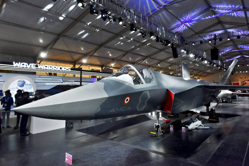 Visitors stand next to a prototype of India’s Advanced Medium Combat Aircraft (AMCA) at an air show in Bengaluru last year. Photo: Reuters