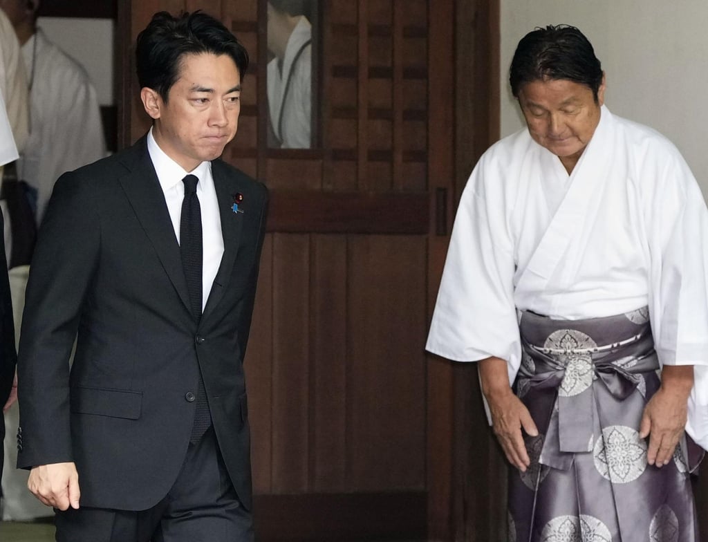 Japan’s Defence Minister Shinjiro Koizumi (left) visits Yasukuni Shrine in Tokyo on August 15. Photo: Kyodo News / AP