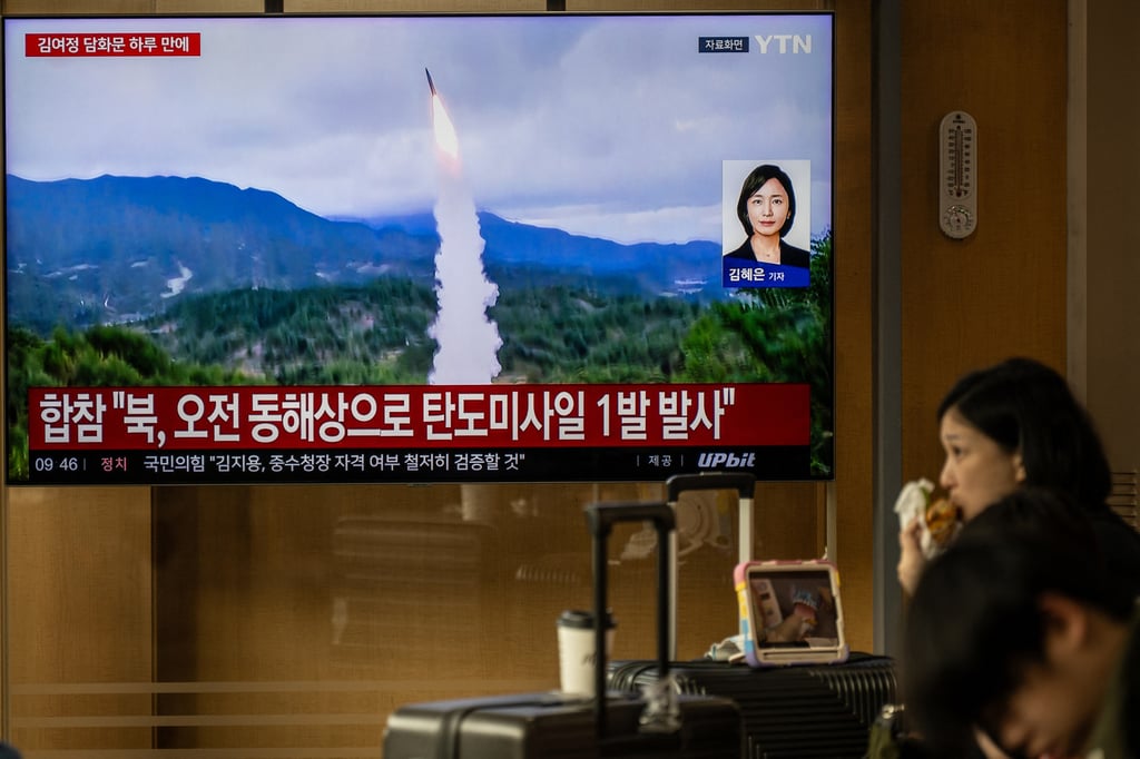 News coverage showing file footage of a North Korean missile launch is seen on a screen at a railway station in Seoul on October 3. Photo: TNS News coverage showing file footage of a North Korean missile launch is seen on a screen at a railway station in Seoul on October 3. Photo: TNS