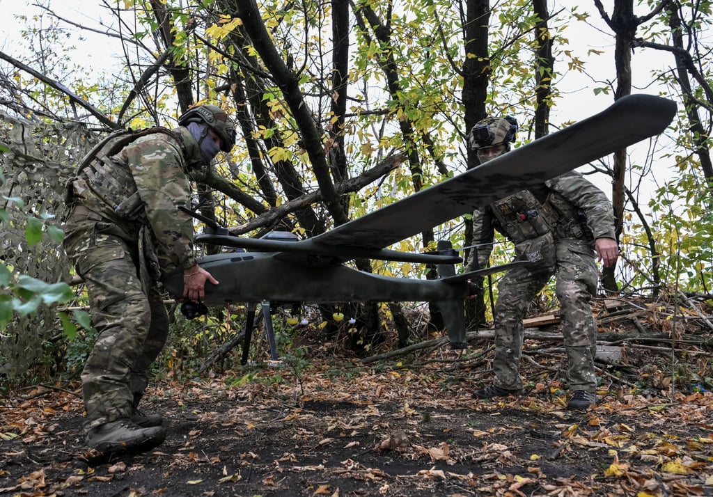 Ukrainian servicemen prepare a reconnaissance and strike drone for a flight near a front line in the Donetsk region on Friday. Photo: Reuters