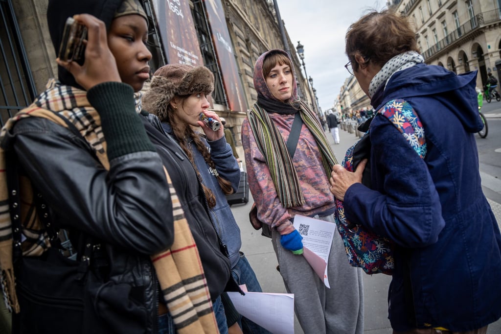 Protesters block an entrance to the Louvre on Monday. Photo: EPA Protesters block an entrance to the Louvre on Monday. Photo: EPA