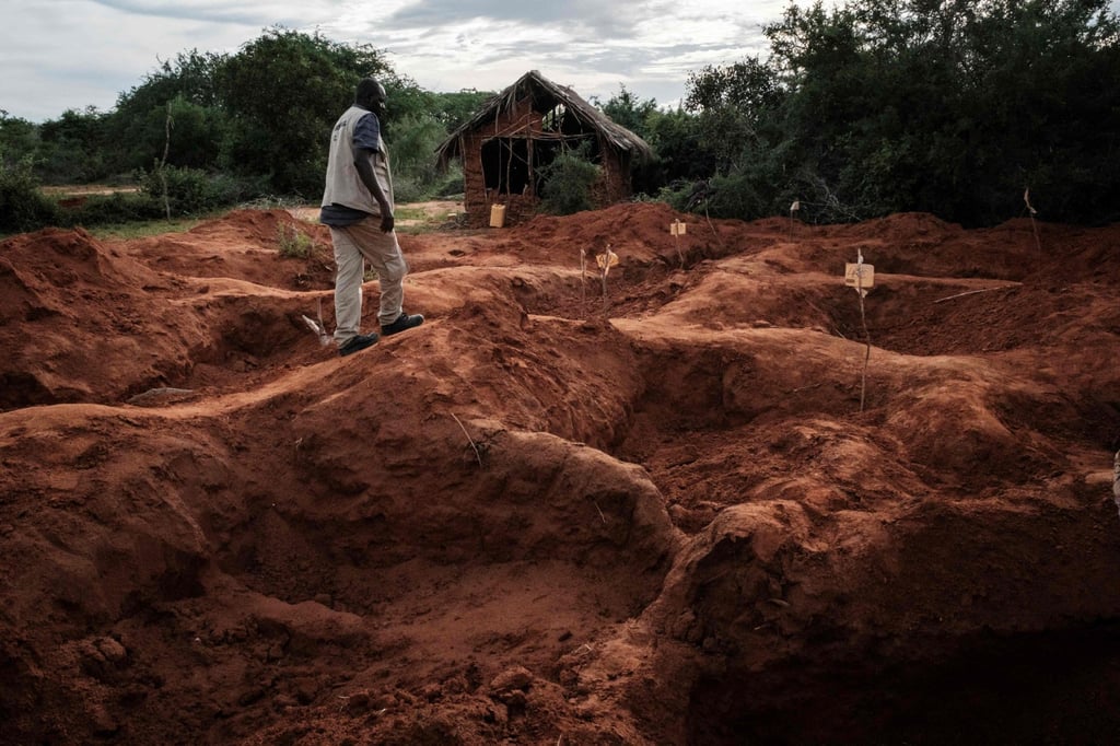 An investigation officer walks at the mass gravesite in Shakahola in 2023. Photo: AFP An investigation officer walks at the mass gravesite in Shakahola in 2023. Photo: AFP