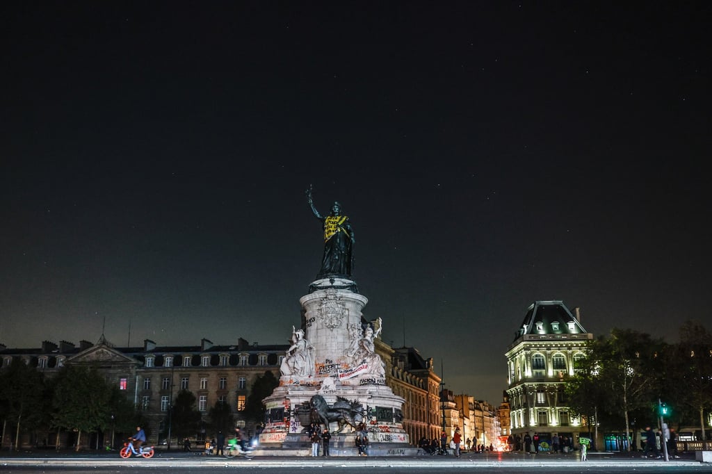 A yellow vest is draped on Paris’ Statue de la Republique on Sunday. Photo: EPA A yellow vest is draped on Paris’ Statue de la Republique on Sunday. Photo: EPA