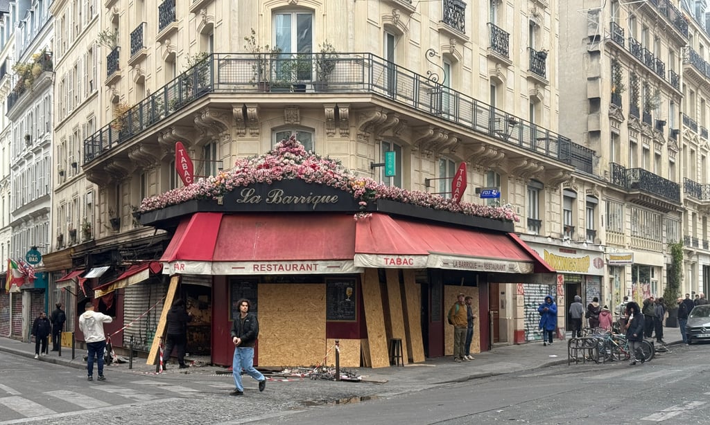 Aline Li’s store was boarded up on Monday after being targeted by rioters as they rampaged through Paris. Photo: Xiaofei Xu Aline Li’s store was boarded up on Monday after being targeted by rioters as they rampaged through Paris. Photo: Xiaofei Xu