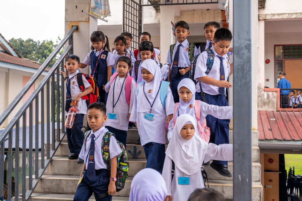 A group of Standard 1 students leave their classroom at a school in Kuala Lumpur. Photo: Shutterstock