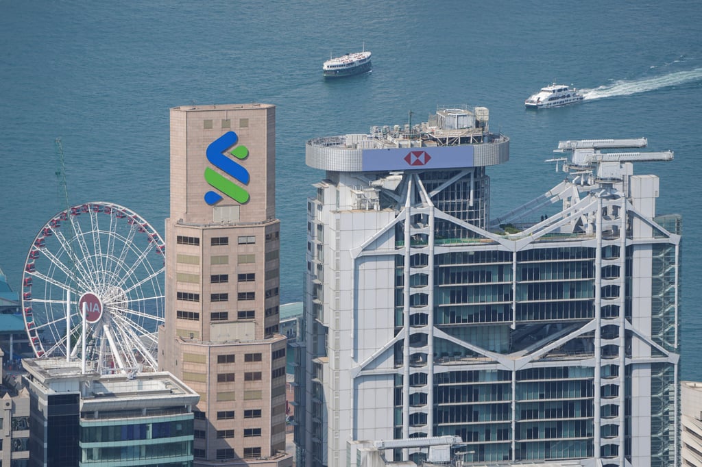 The Standard Chartered Bank Building and HSBC Building in Central. HSBC and Anchorpoint Financial, a joint venture led by Standard Chartered, have been granted stablecoin issuer licences. Photo: Eugene Lee