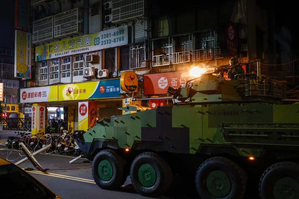 A member of Taiwan’s military fires from an armoured vehicle in Taipei on August 13 during the Han Kuang exercises. Photo: EPA A member of Taiwan’s military fires from an armoured vehicle in Taipei on August 13 during the Han Kuang exercises. Photo: EPA