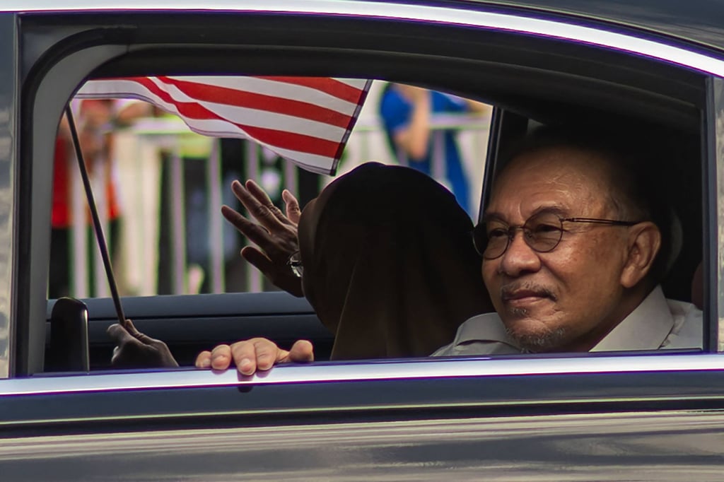 Malaysian Prime Minister Anwar Ibrahim and his wife Wan Azizah Wan Ismail arrive for the 69th National Day celebrations in Putrajaya in August. Photo: AFP Malaysian Prime Minister Anwar Ibrahim and his wife Wan Azizah Wan Ismail arrive for the 69th National Day celebrations in Putrajaya in August. Photo: AFP