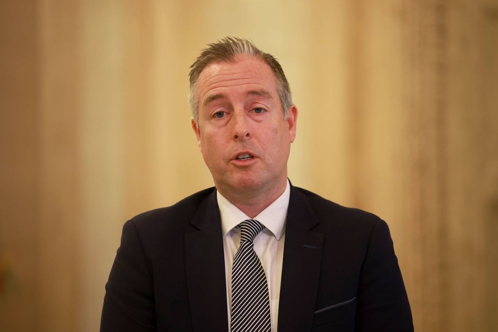 Northern Ireland’s Education Minister Paul Givan speaks to the media in Stormont on Monday after more than 150 schools received bomb threats. Photo: PA Wire / dpa Northern Ireland’s Education Minister Paul Givan speaks to the media in Stormont on Monday after more than 150 schools received bomb threats. Photo: PA Wire / dpa