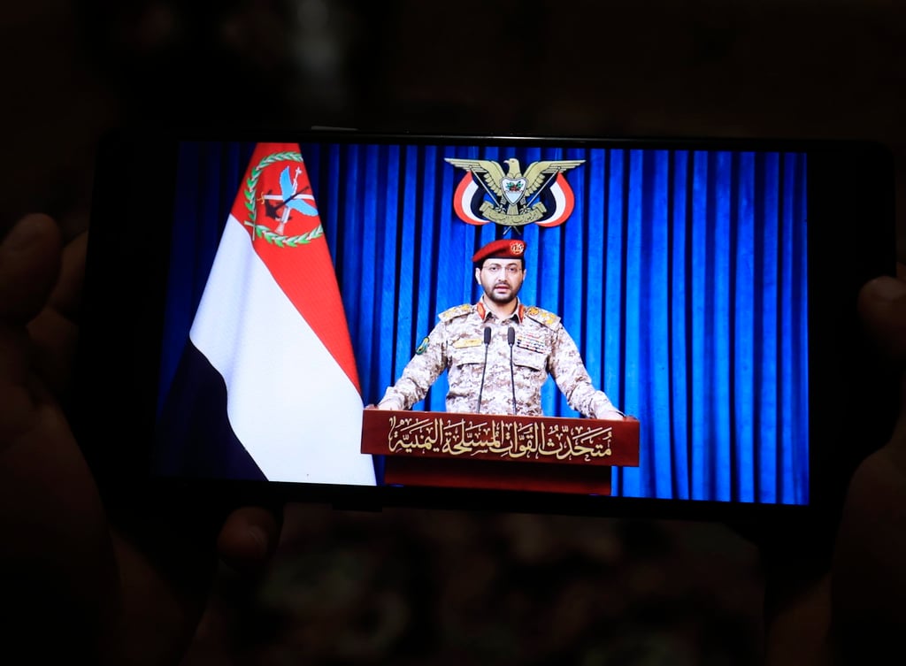 Houthi military spokesman Yahya Saree delivers a statement on Monday, seen on a mobile phone in Sanaa, Yemen. Photo: EPA