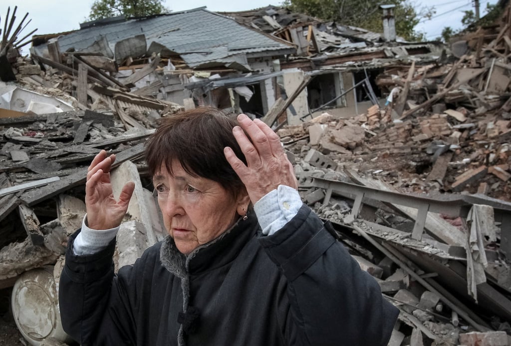 A woman stands at a site of her family’s house destroyed during a Russian air strike on the outskirts of Dnipro, Ukraine on Monday. Photo: Reuters A woman stands at a site of her family’s house destroyed during a Russian air strike on the outskirts of Dnipro, Ukraine on Monday. Photo: Reuters