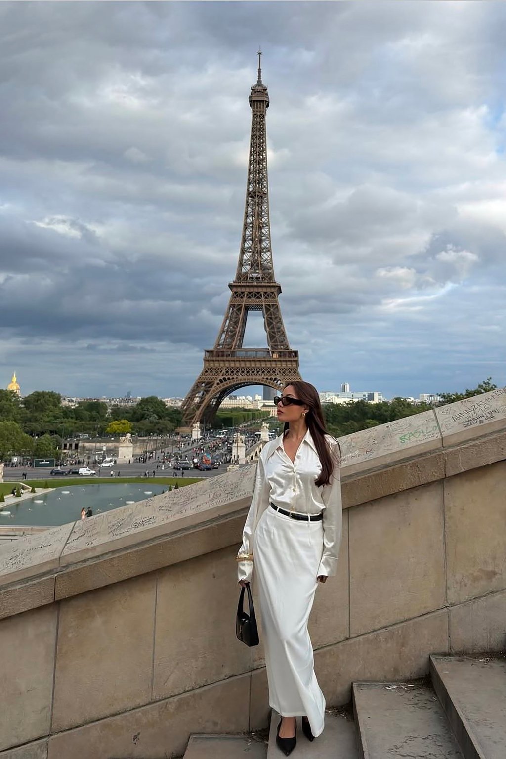 Zofia Canlas in Paris, France, with the Eiffel Tower in the background. Photo: Instagram/Zofia Canlas