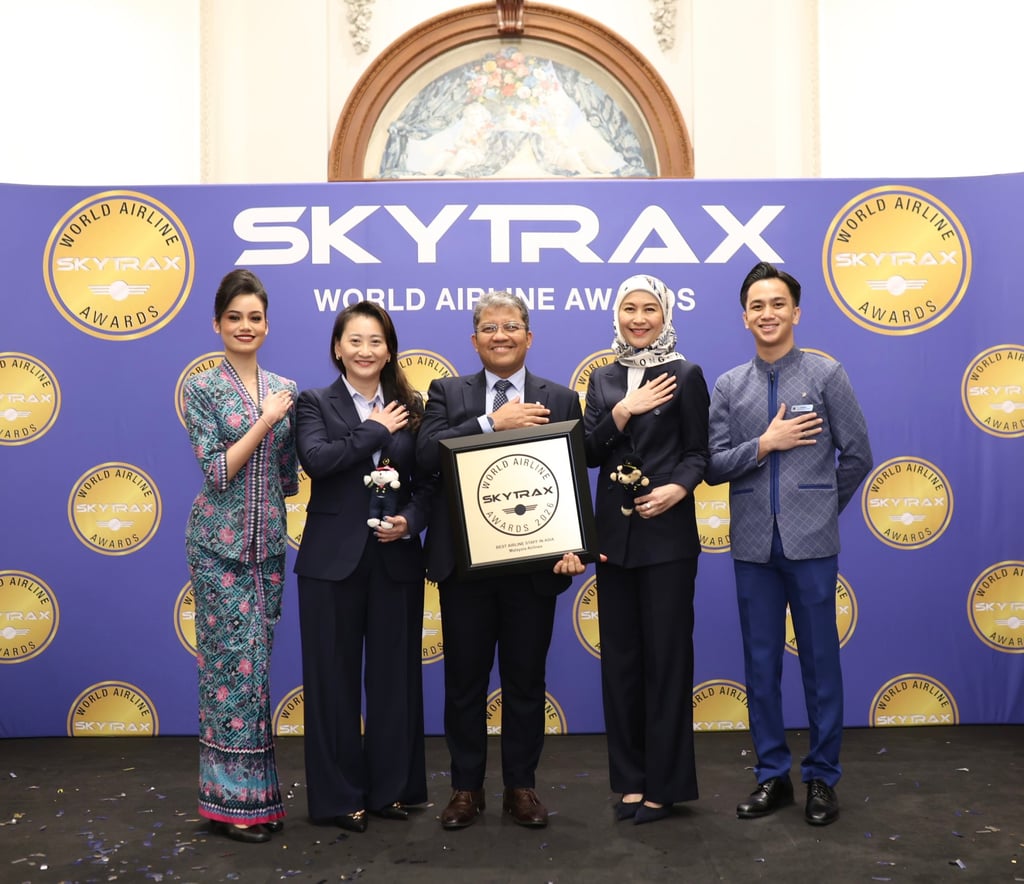 Captain Nasaruddin A. Bakar (centre), president and group CEO of Malaysia Aviation Group, accepts the Skytrax Best Airline Staff in Asia award at last month’s ceremony in London. Captain Nasaruddin A. Bakar (centre), president and group CEO of Malaysia Aviation Group, accepts the Skytrax Best Airline Staff in Asia award at last month’s ceremony in London.