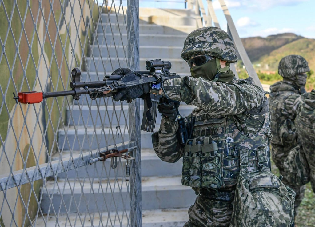 South Korean Marines taking part in a comprehensive island defence exercise on Baengnyeong near the maritime border with North Korea on Wednesday. Photo: South Korean Defence Ministry / AFP