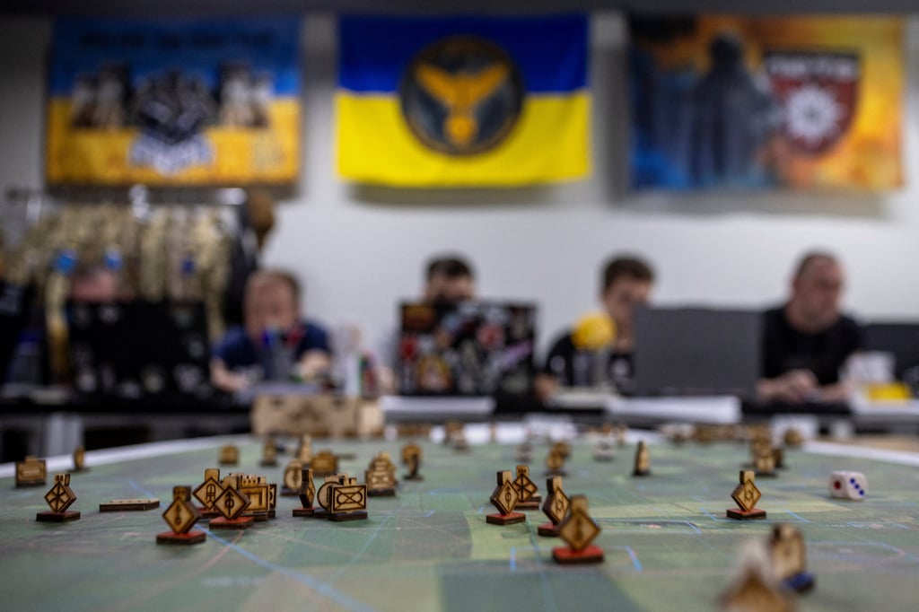 Frontline officers and military instructors take part in a war gaming exercise during a 12-week Nato-style tactical planning and command programme in Kyiv, Ukraine, on July 14. Photo: Reuters Frontline officers and military instructors take part in a war gaming exercise during a 12-week Nato-style tactical planning and command programme in Kyiv, Ukraine, on July 14. Photo: Reuters